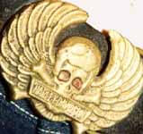 Victim's belt buckle