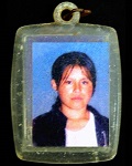 Keychain with photograph found on the decedent